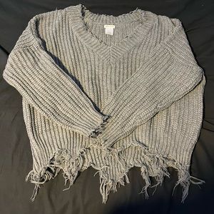 Grey sweater.